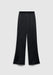 A pair of black wide-leg pants with a relaxed fit, featuring an elastic waistband and a smooth, slightly glossy finish, displayed against a plain background.