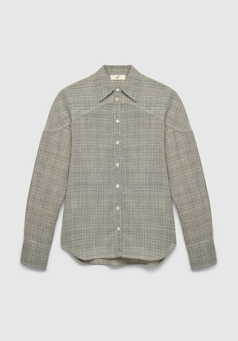 A long-sleeve button-up shirt in a textured gray fabric with a subtle woven pattern, featuring a pointed collar and a relaxed fit, displayed against a plain background.