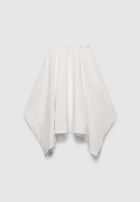 A white skirt with a flowing, asymmetrical hem, featuring a gathered waistband and draped paneling for a soft, sculptural silhouette, displayed against a plain background.