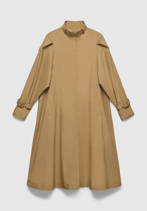 A long camel-colored coat with a loose, A-line silhouette, featuring a high collar, concealed front closure, adjustable cuff straps, and subtle side pockets, displayed against a plain background.