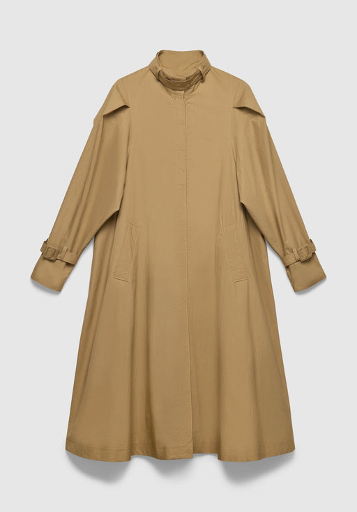 A long camel-colored coat with a loose, A-line silhouette, featuring a high collar, concealed front closure, adjustable cuff straps, and subtle side pockets, displayed against a plain background.