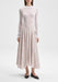 The outfit is shown from a straight-on, front-facing angle, with the model standing upright and facing directly toward the camera.