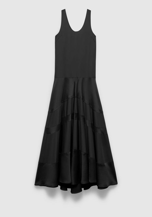 A black sleeveless midi dress with a fitted bodice and wide shoulder straps, featuring a gathered, tiered skirt that creates a full, flowing silhouette, displayed against a plain background.