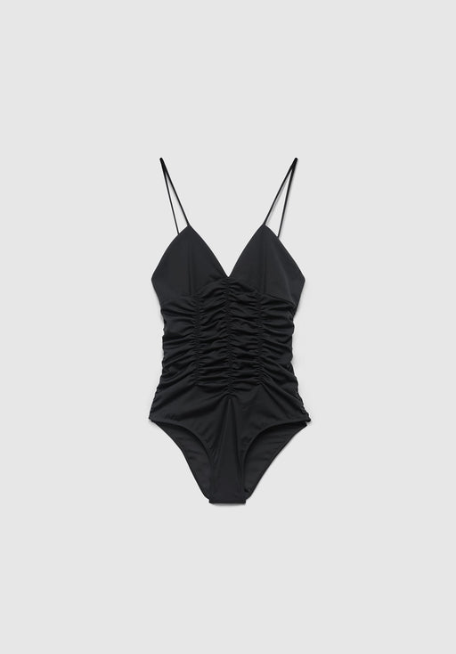 Black ruched one-piece swimsuit with a deep V-neckline and thin spaghetti straps, laid flat against a plain background.