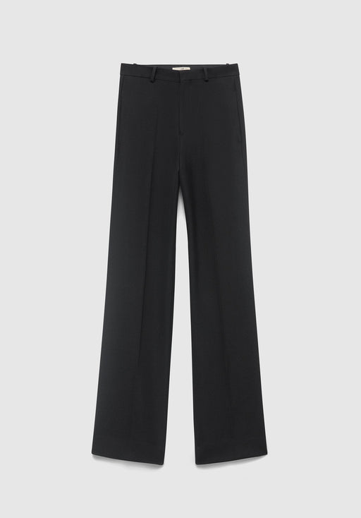 A pair of black wide‑leg dress pants laid flat on a light gray background, featuring a tailored crease down each leg, belt loops, and side pockets.