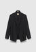 A black tailored blazer hanging against a light gray background, featuring a notched lapel, long sleeves, and a visible inner collar tag.